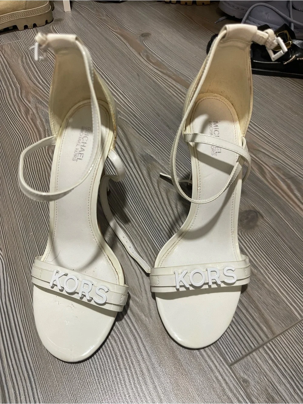Michael Kors White 'KORS' Ankle-Strap Heels - Picture 1 of 2